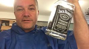 Cut the bottom off Jack Daniel's bottles