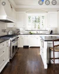 Black And White Kitchen With Wood Countertops Pin On Home Decor Ideas