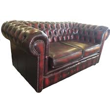 87 w x 29 h x 37.25 d. Chesterfield Antique Oxblood Red Genuine Leather Two Seater Sofa