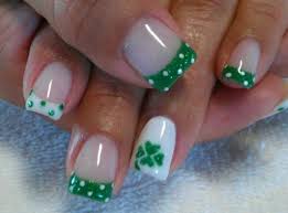 Wearing green and shamrocks details is customary. St Patricks Day Nail Designs