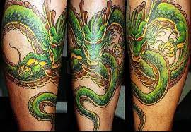 Tattoo on l_arm (lfa femal faces, inner arm snake); 30 Dragon Ball Z Tattoos Even Frieza Would Admire The Body Is A Canvas Z Tattoo Dragon Ball Tattoo Dragon Ball Z Tattoos