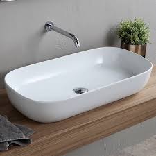 glam oval white ceramic vessel sink