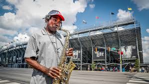 Indy 500 fans can't go inside, but gather outside IMS
