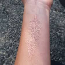 Tribal tattoo designs are also another popular one to get done in white ink, especially when that tattoo is on your face. 40 Stunning White Ink Tattoos You Ll Love Spiritustattoo Com