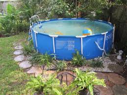 Landscaping Ideas For Above Ground Swimming Pool Small Above Ground Pool Above Ground Pool Landscaping Swimming Pool Designs