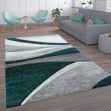 Durch die farbakente in grün und türkis bei dem outdoor teppich malaki 3650 verleiht dieser teppich jedem raum einen Wohnzimmer Teppich Wellen Linien Grau Grun Teppichcenter24