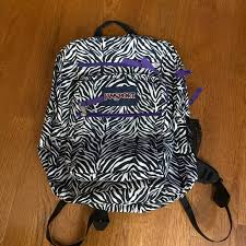 Jansport black and white backpack. Jansport Bags Jansport Zebra Black White Backpack Purple Poshmark