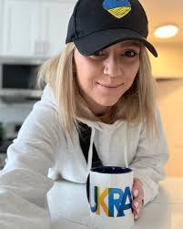 Ukrainian to the core- Українка до костей. Born and raised in Ukraine-  виросла в Україні. Live and breath Ukraine- обожнюю і підтримую все що  пов'язане з Україною