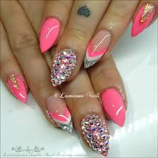 Girls with different temperaments can get the sweet feeling of pink very well. Luminous Nails Neon Pink White Silver Acrylic Nails With Swarovski Crystal Feature Nails