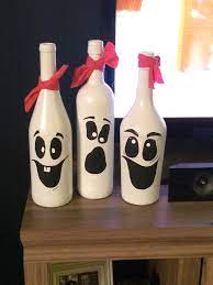 Wine Bottle Ghosts So Easy Spray Paint Wine Bottles And Acrylic Paint For Faces Dollar Store Halloween Decorations Bottle Crafts Wine Bottle Crafts wine bottle ghosts so easy spray