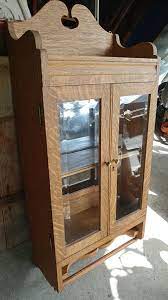 The cabinet is crafted from solid teak (ideal for bathrooms), and it has two mirrors, both of which are 21.875 x 24 inches and mounted on a convenient sliding door. Beautiful Large Antique Medicine Cabinet Solid Tiger Oak Excellent Long Valley Traders