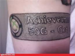 He's one proud father and immediately put on his shirt afterwards. Achievement Unlocked Ugliest Tattoos Funny Tattoos Bad Tattoos Horrible Tattoos Tattoo Fail