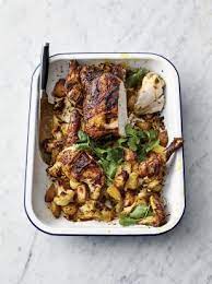 Preheat The Oven To 180ºc 350ºf Gas 4 Wash The Potatoes And Chop Into 3cm Chunks Trim The Cauli Stalk Rem Recipes Jamie Oliver Recipes Roast Chicken Recipes