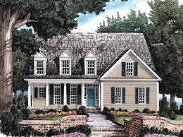 Unless you are a color enthusiast like myself. Blue Door Tan House White Black Trim Accents Tan House Exterior Paint Colors For House House Exterior