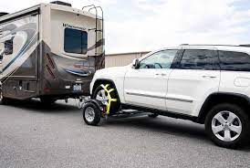 Having an extra compact vehicle on camping trips is very convenient, that's why it is not uncommon to see big rvs pulling smaller vehicles behind them. How To Tow A Car Behind An Rv Car Tow Dolly