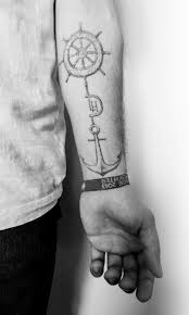 Black and white anchor with flowers tattoo. 90 Anchor Tattoos That Pay Homage To The Traditional Tattoo Subject