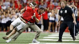Interviews from ohio state football players and coaches. Watch Ohio State Football Coach Body Slam Fan Abc News