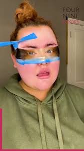 Unconventional Makeup Look with Gold Spray Paint and Masking Tape