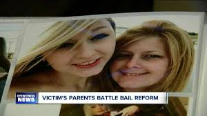 Domestic violence victim's parents battle bail reform