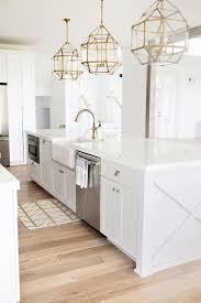 White Kitchen Brass Accents One Too Many Pendants Love Them X Detail On The Islan White Kitchen Inspiration Gorgeous White Kitchen White Kitchen Design