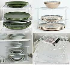It fits neatly in the corner of your cupboard and will hold weight of up to 10 kg per shelf. New 3tier Corner Plate Kitchen Cupboard Organiser Tidy Storage Rack White Coated Ebay