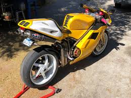 Image result for Nuget Yellow 1999 Motorcycle