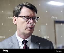 Blair Horner of the New York Public Interest Research Group speaks to  reporters at the Capitol