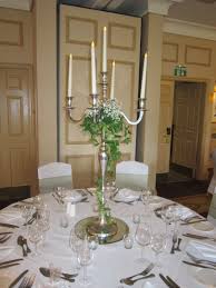 I Have 3 X Candelabras From The Hotel Florist Is Bringing Ivy Decoration For Around The Ste October Wedding Centerpieces Candelabra Wedding Candelabra Flowers