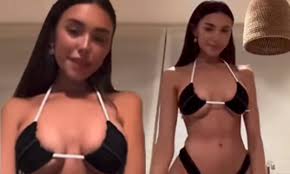 Madison Beer showcases her flat midriff and ample cleavage in tiny black  and pink bikini | Daily Mail Online