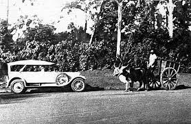 Viceregal carriage and mounted escort passing along the Walkeshwar Road, Bombay— c. 1900.