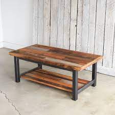 Each piece of wood in the tabletop is selected for its contrast and character. Industrial Reclaimed Wood Patchwork Coffee Table Lower Shelf What We Make