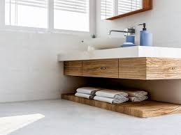 The style, constructed of solid hardwood, has two functional drawers and a porcelain sink and countertop with space for bathroom essentials. Beautiful Bathroom Vanity Design Ideas