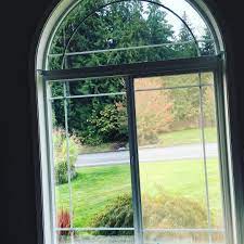 this is a cool shot of two tinted windows and one that is not tinted the tinted glass is much more pleasing to look out tinted windows fun shots residential