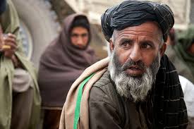 Haji Abdul Naza of Janak Kalay, prepares to speak with