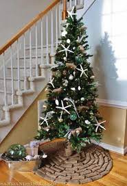 By adding stockings to the fireplace, you can add a christmas tree near the fireplace. 30 Brilliant Coastal Chic Christmas Tree Decorating Ideas
