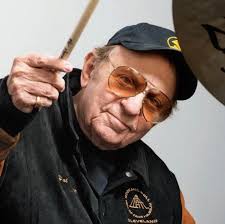 Fluid acrylic, movement was playing the canvas to music with my drum  sticks.