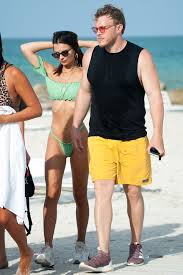 Emily ratajkowski posts sassy snap on her wedding day credit: Bikini Clad Emily Ratajkowski Cuddles Up To Husband Sebastian Bear Mcclard As He Playfully Pats Her Bottom During Miami Beach Break Mirror Online