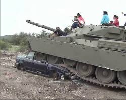 Image of someone driving a tank in Texas