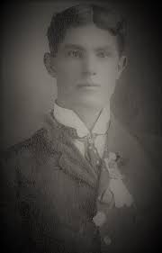 This is my Daddy Albert H. Garner born 1906 . Daddy was a carpenter until  he retired. After that he went into the hubcap business. He was the little  boy with the