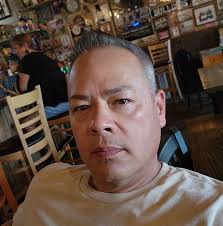 Removing large black snakes from garages in Galena Kansas