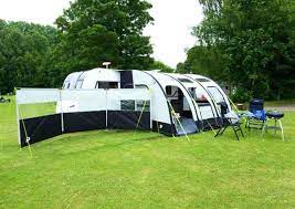Luxurious traditional awning fabric and real cotton drape curtains and a polka print interior. Awning Review Prima Deluxe Infinity Advice Tips New Used Caravans Caravanning Reviews Out And About Live