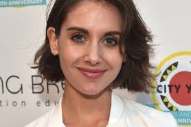 She keeps her midriff bare, wears tattoos, and dresses in hip clothing. Alison Brie Was Asked To Take Off Top In Entourage Audition