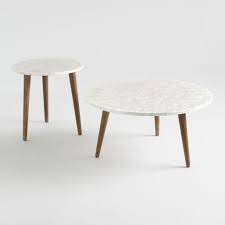 The pedestal collection, including the saarinen dining table, was the result of eero saarinen addressing the unrestful world underneath chairs and tables. Round Capiz Table Collection World Market
