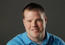 Aaron Redman: Eye cancer survivor volunteers to help children with cancer