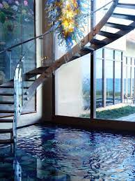 Indoor Pool Area With Spiral Staircase Million Dollar Rooms Floating Staircase Floating Stairs