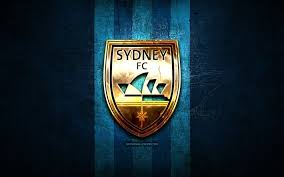 Media in category team logos. Download Wallpapers Sydney Fc Golden Logo A League Blue Metal Background Football Fc Sydney Australian Football Club Fc Sydney Logo Soccer Australia For Desktop Free Pictures For Desktop Free