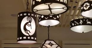 The sw santa fe chandelier from our plaza collection incorporates old southwestern patterns into a modern, yet timeless, chandelier design that brings comfort and creates a statement in your home. Custom Southwest Lighting Video Ceiling Lights Rustic Ceiling Lights Southwestern Lighting