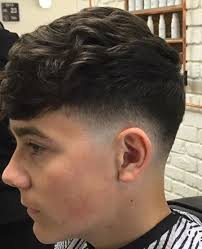 A fade is shorter than a taper and ends when it reaches the skin — essentially fading in. Tapered Medium Haircut Curly Hairstyles For Men Askhairstyles