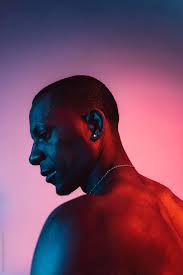 Portrait Of A Man Under Blue And Red Lights By Luis Velasco For Stocksy United Neon Photography Neon Photoshoot Portrait