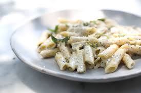 Mix milk, parmesan cheese, basil, oregano, salt, and black pepper into onion mixture. Pasta In White Sauce And Cheese Sauce